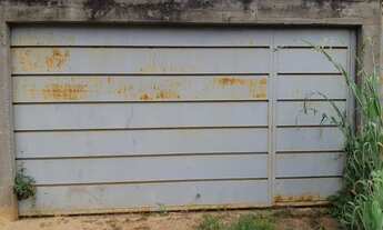 Imagem 3: Lote Jardim Nova Era 400,79 m2 murado portão fechado e aterrado escorrido para frente asfa