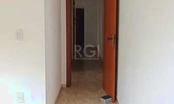 Imagem 5: Apartamento 2 dormitórios, reformado, andar térreo. Próximo da Av. Protásio Alves. Jardim