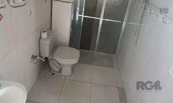 Imagem 5: Vende terreno 300m², com 3 casas, casa da frente 2 dormitórios, sobrado nos fundos parte d