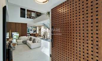 Imagem 2: Sobrado para venda com 405 metros quadrados com 5 suítes em Riviera - Bertioga - SP