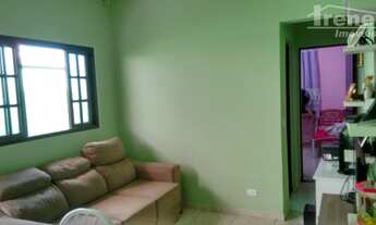 Imagem 3: Casa com três dormitórios, próximo de comércios em Itanhaém