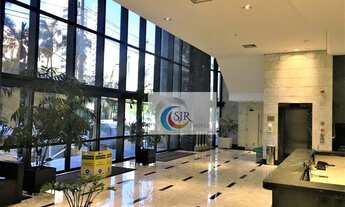 Imagem 3: Sala comercial de 142 m², com 5 vagas de garagem, piso elevado, ar condicionado central. E