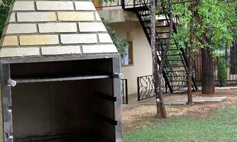 Imagem 6: Recanto Capim Dourado. Aluguel de quartos e espaço com piscina e churrasqueira