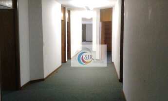 Imagem 7: Sala comercial de 562m² com piso elevado, móveis, 9 salas, 9 banheiros e 12 vagas de garag