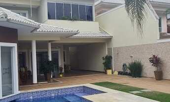 Imagem 3: Casa de condomínio para venda tem 440 metros quadrados com 4 quartos