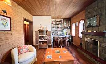 Imagem 3: Casa rústica de alto padrão à venda com quatro suítes no Condomínio Estância Marambaia Vin