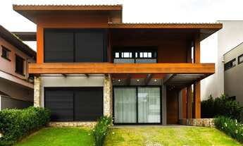 Imagem 2: Casa alto padrão com 4 suítes à venda, 322m², em condomínio fechado com acesso exclusivo à