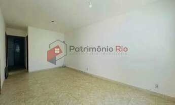 Imagem 7: Casa com três quartos, quintal e garagem - Irajá