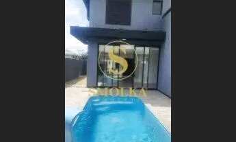 Imagem 5: Casa em condomínio à venda com 5 suítes e 4 vagas de garagem em condomínio no bairro Cacho