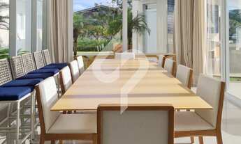 Imagem 7: Uma mansão térrea com curvas que são puro encanto e vista deslumbrante para o pôr do sol à