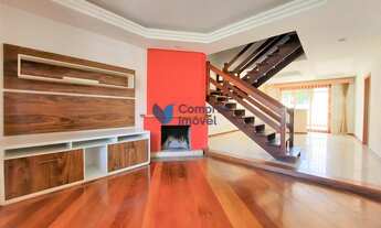 Imagem 3: Casa em condomínio com pátio individual, 4 quartos sendo 2 suítes, vagas em garagem fechad