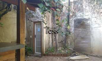 Imagem 2: 3 dormitorios sendo 2 suítes, cozinha planejada com coifa rica em armarios