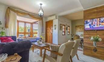 Imagem 3: Casa de 103m² - 3 dormitórios, 1 suíte, churrasqueira, pátio e 2 vagas de garagem no bairr