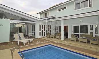 Imagem 1: Casa de condomínio para venda possui 403 metros quadrados com 4 quartos