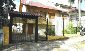 Imagem 2: Casa com 3 dormitórios para alugar, 100 m² por R$ 2.650,00/mês - Cavalhada - Porto Alegre