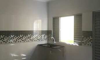 Imagem: Suíte com cozinha integrada e área de