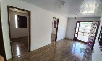 Imagem 3: Vende terreno 300m², com 3 casas, casa da frente 2 dormitórios, sobrado nos fundos parte d