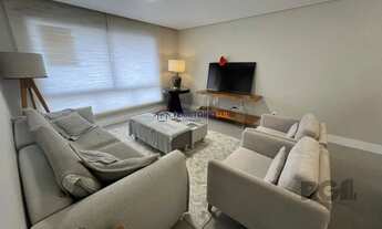 Imagem 3: Apartamento de três quartos, suíte e uma vaga de garagem no bairro Independência em Porto