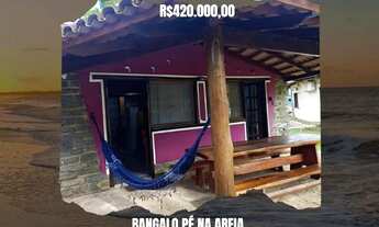 Imagem: Bangalô pé na areia em prado praia de