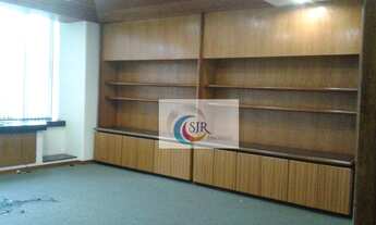 Imagem 2: Sala comercial de 562m² com piso elevado, móveis, 9 salas, 9 banheiros e 12 vagas de garag