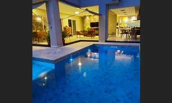 Imagem 6: Casa de condomínio para venda possui 500 metros quadrados com 5 quartos