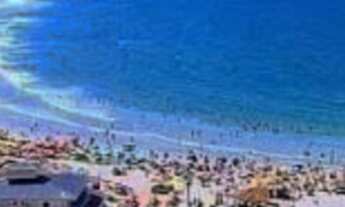 Imagem 2: Excelente terreno frente norte,perto da praia, mercado, farmácia com escritura pública