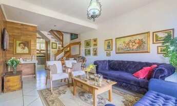 Imagem 2: Casa de 103m² - 3 dormitórios, 1 suíte, churrasqueira, pátio e 2 vagas de garagem no bairr