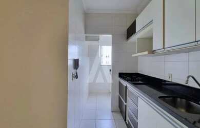 Imagem 5: Apartamento semimobiliado com 2 quartos sendo 1 suite, sacada com churrasqueira no bairro