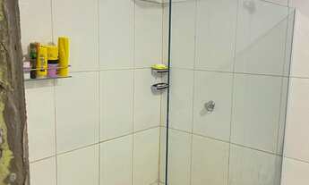 Imagem 6: Casa aconchegante com varanda e quintal