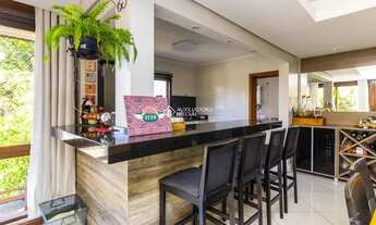 Imagem 7: Casa de condomínio para venda tem 243 metros quadrados com 3 quartos