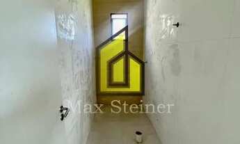 Imagem 7: Sobrado com 3 dorms suítes com Jacuzzi para 5 lugares na área de lazer com filtro e aquec