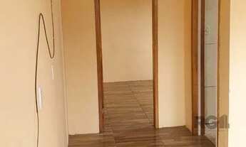 Imagem 4: Vende terreno 300m², com 3 casas, casa da frente 2 dormitórios, sobrado nos fundos parte d