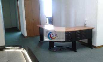 Imagem 4: Sala comercial de 562m² com piso elevado, móveis, 9 salas, 9 banheiros e 12 vagas de garag