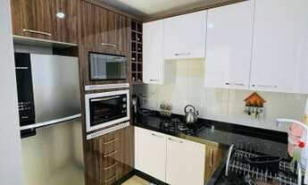 Imagem 5: Apartamento semi mobiliado, com dois quartos, com ótima localização, no Centro, há uma qua