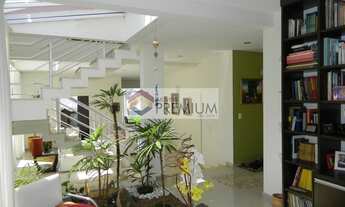 Imagem 4: Casa ensolarada em condomínio fechado com 3 suítes, escritório e 4 vagas de garagem, próxi