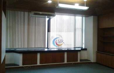 Imagem 6: Sala comercial de 562m² com piso elevado, móveis, 9 salas, 9 banheiros e 12 vagas de garag