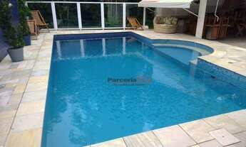 Imagem 3: Casa com 5 dormitórios à venda, 301 m² por R$ 3.350.000,00 - Riviera - Módulo 30 - Bertiog