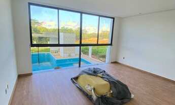 Imagem 6: Casa de condomínio para venda possui 338 metros quadrados com 4 quartos