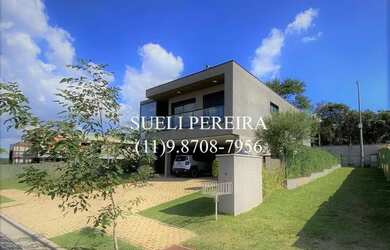 Imagem 3: Casa de condomínio para venda possui 400 metros quadrados com 4 quartos, localizada na Gra