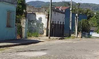 Imagem 2: 3 casas de alvenaria, sendo 1 mista 1 meia água