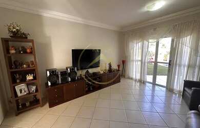 Imagem 6: Casa térrea à venda no condomínio Alphaville Campinas, sala ampla para 3 ambientes, lavabo