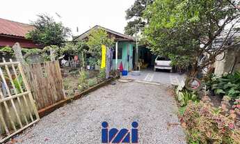 Imagem: Casa com espaço de terreno a venda no litoral