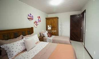 Imagem 7: Casa para venda possui 310 metros quadrados com 4 quartos em Praia da Cal - Torres - RS