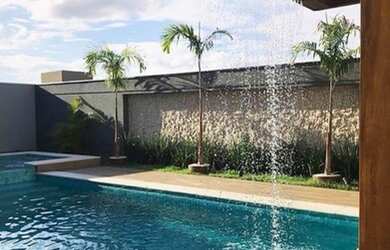 Imagem 2: Casa de condomínio para venda possui 400 metros quadrados com 4 quartos