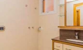 Imagem 4: Apartamento para venda tem 99 metros quadrados com 3 quartos em Passo da Areia - Porto Ale