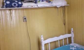 Imagem 5: Terreno com chalé de madeira