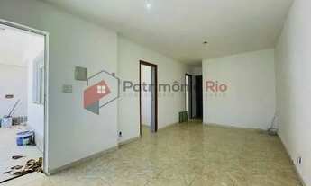 Imagem 5: Casa com três quartos, quintal e garagem - Irajá