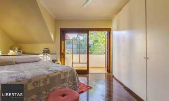 Imagem 2: Casa de 297m² no centro de canoas, com 3 quartos, 1 suíte e 3 vagas de garagem