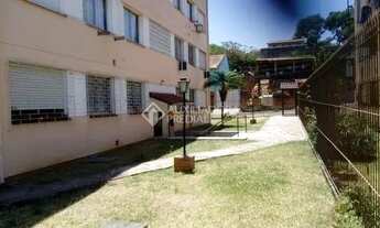 Imagem 2: Apartamento térreo de 1 dormitório com 42m2. Garagem próxima à venda(separada