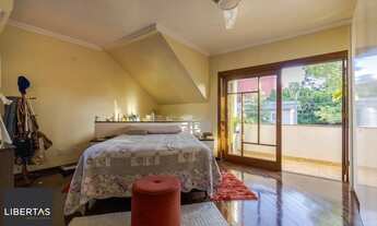 Imagem 3: Casa de 297m² no centro de canoas, com 3 quartos, 1 suíte e 3 vagas de garagem